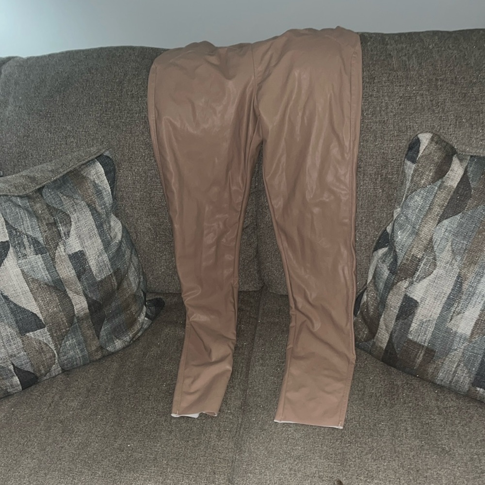 I am saling tan stretchy leggings brand new never worn